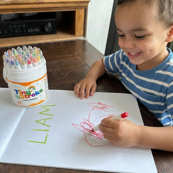 Kid coloring with TinyStroke crayons